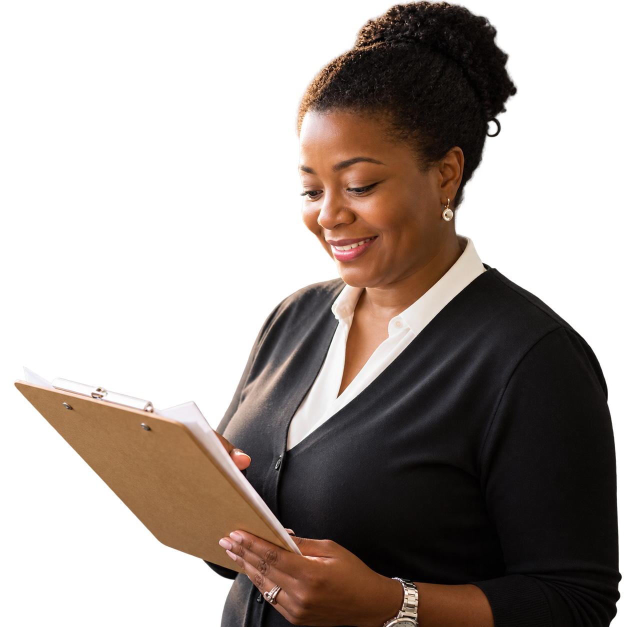 A childcare director smiling while reviewing a clipboard in a bright early learning classroom